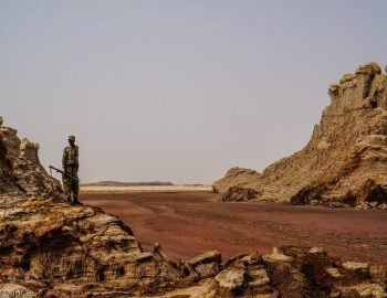 Danakil Depression tour, soldier in desert of the Danakil Depression.