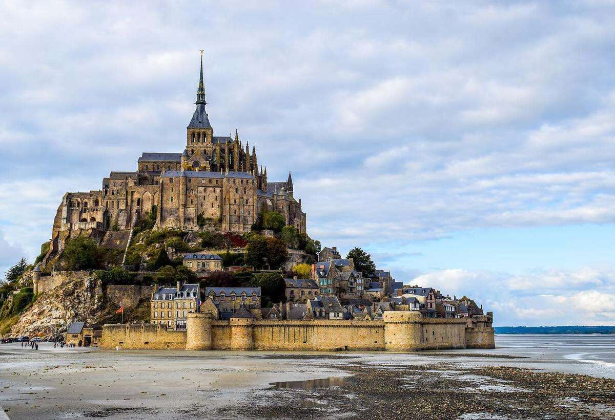 famous landmarks in France, abbey on island in the sea.
