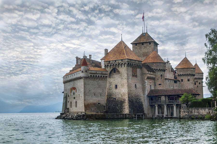 Castles in Switzerland, castle on a lake.