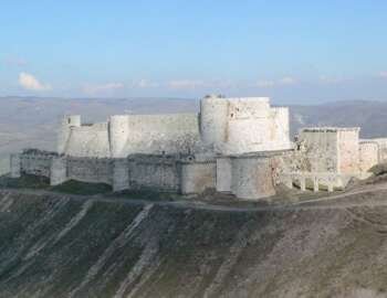 Castles of the Crusades, large castle on a hill.